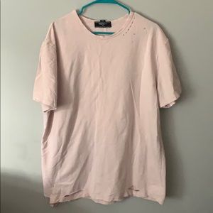 Light pink ripped tee.